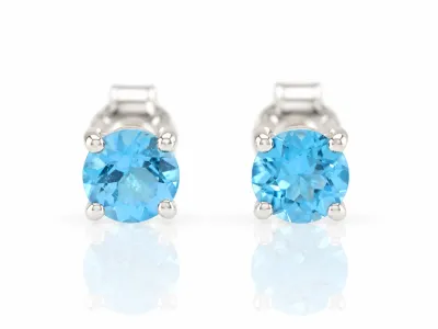 Srebrne kolczyki z naturalnym niebieskim topazem "Swiss Blue"